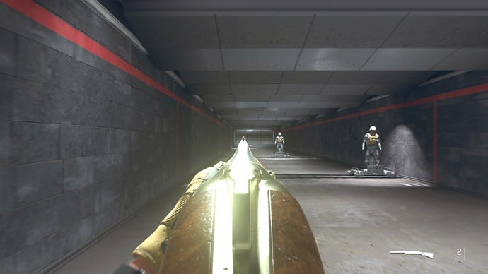 The player in Warzone 2.0 aims at a training dummy with the Lockwood 300 ironsights.