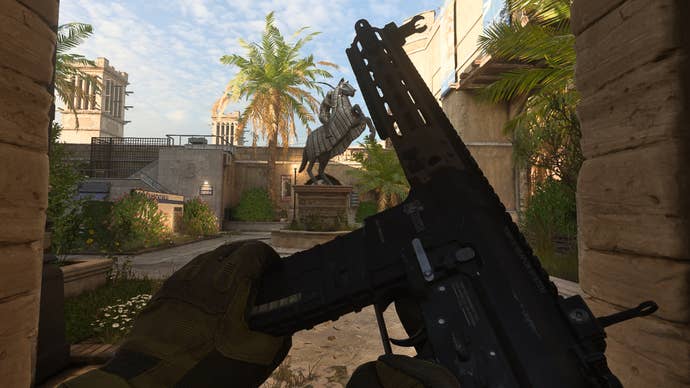 The player in Warzone 2.0 inspects their weapon, the M4.