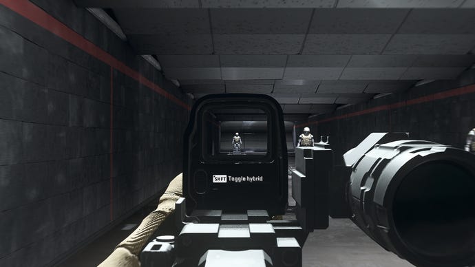 The player in Warzone 2.0 aims at a training dummy using the DR582 Hybrid Sight optic attachment.