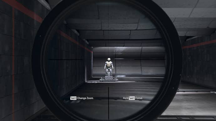 The player in Warzone 2.0 aims at a training dummy using the FTAC Locus SP optic attachment.