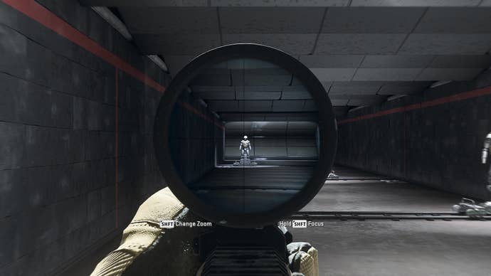 The player in Warzone 2.0 aims at a training dummy using the Luca Bandera Scope optic attachment.