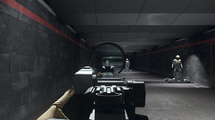 The player in Warzone 2.0 aims at a training dummy using the Monocle CT90 optic attachment.