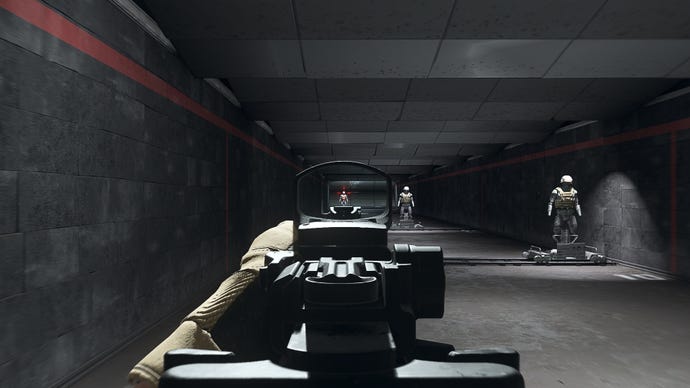 The player in Warzone 2.0 aims at a training dummy using the SZ Mini optic attachment.
