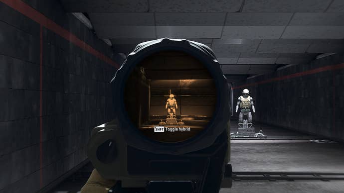 The player in Warzone 2.0 aims at a training dummy using the Thermo Optic x9 optic attachment.