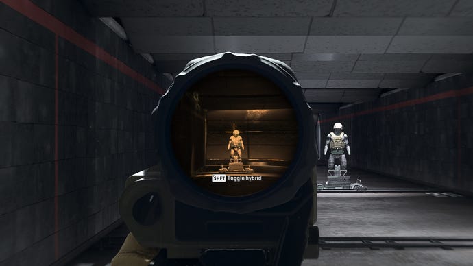 The player in Warzone 2.0 aims at a training dummy using the Thermo Optic x9 optic attachment.