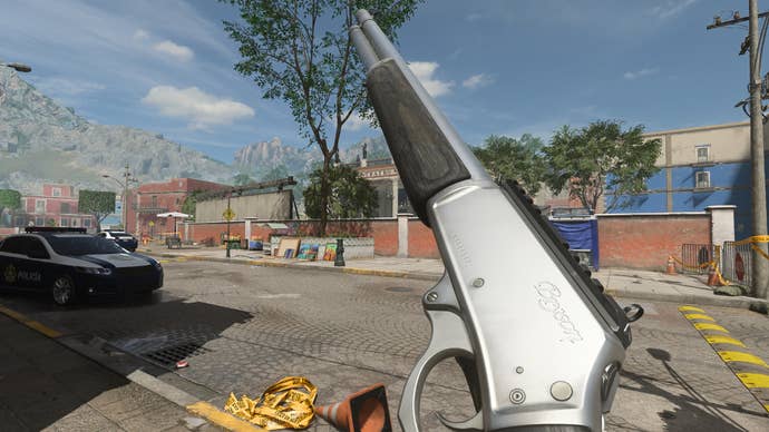 The player in Warzone 2.0 inspects their weapon, the SP-R 208.