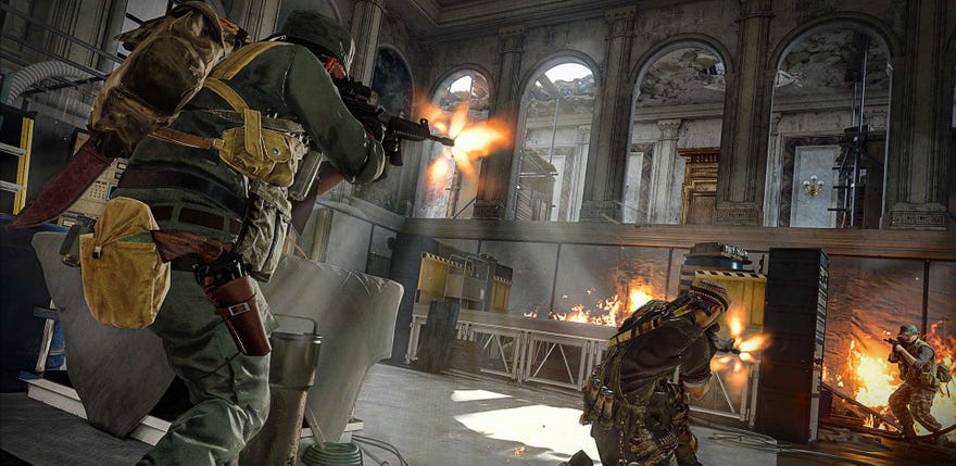 COD operators shoot at each other in an atrium.