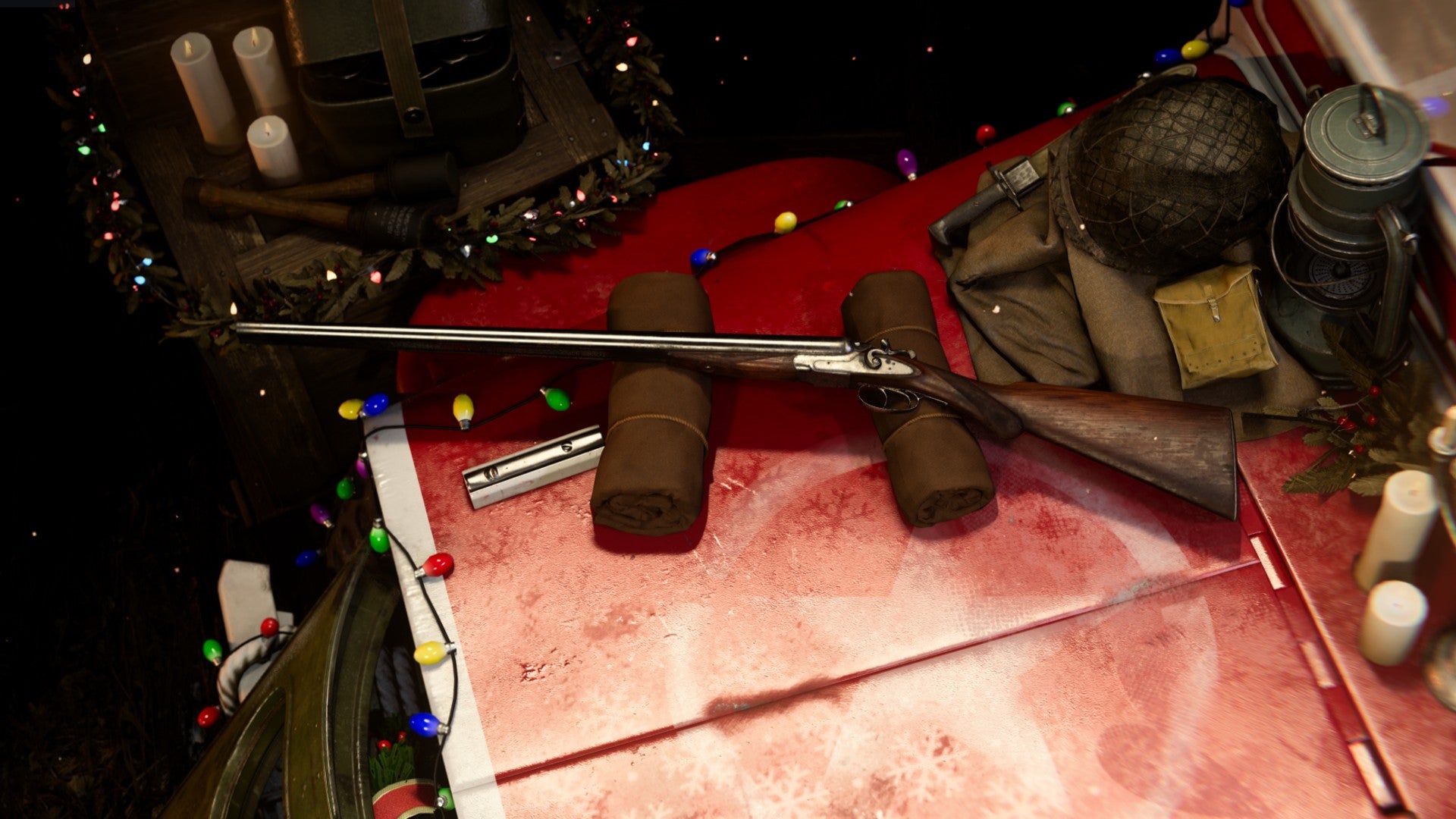 Double Barrel on a blanket surrounded by festive Christmas decorations and lights