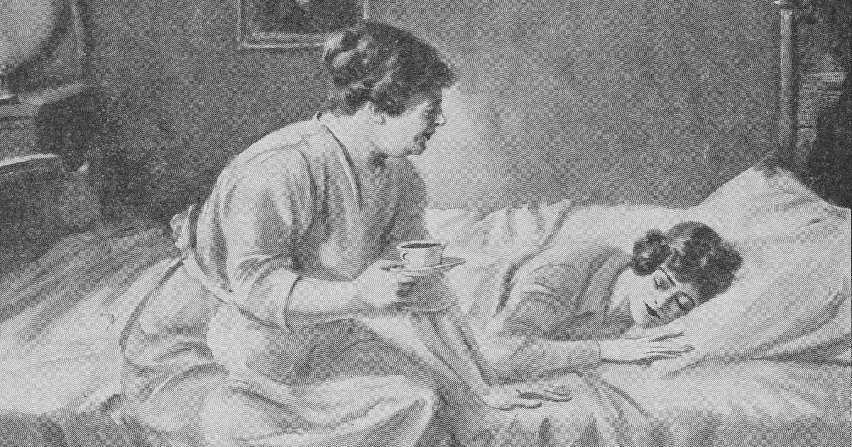 A woman brings a cup of coffee to a woman in bed