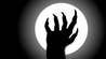 A black and white illustration showing a werewolf hand silhouetted against a full moon.