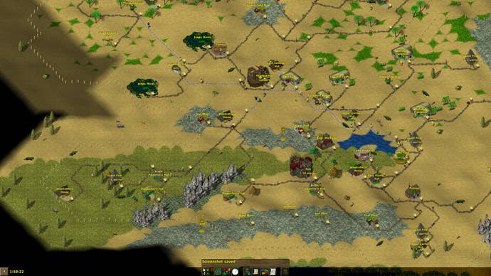 Desert terrain with forts and other large buildings dotted across it in Widelands.