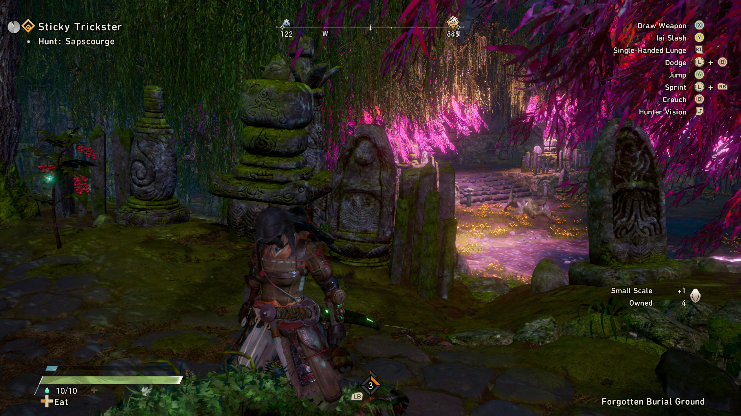 A hunter collecting Small Scale from a monitor lizard in Wild Hearts