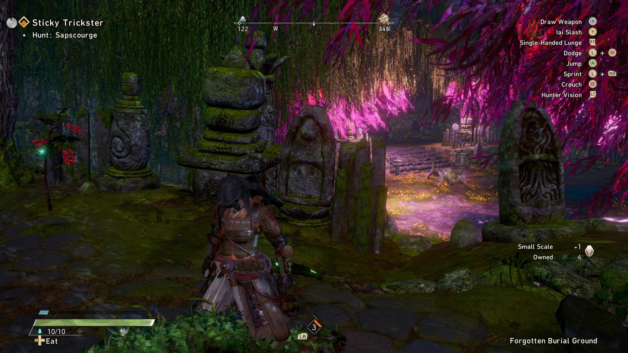 A hunter collecting Small Scale from a monitor lizard in Wild Hearts - 7