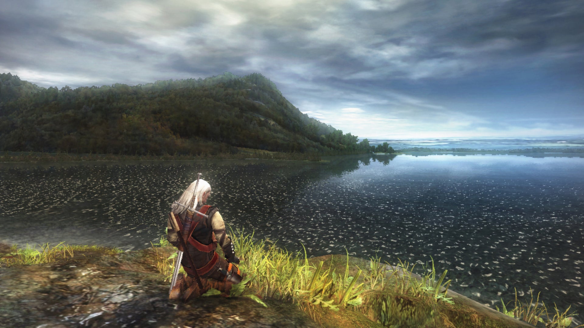 Image 1: Geralt meditates in the first Witcher game.