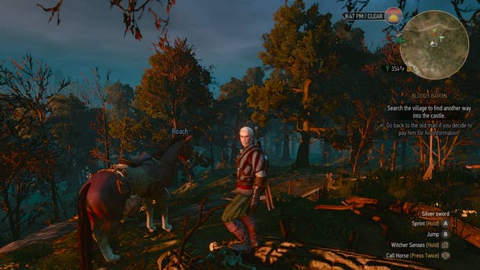 The Witcher 3 saddlebags: A man wearing red and white striped clothing is standing next to a horse. Both are in the middle of a swampy area surrounded by trees bathed in the red glow of sunset