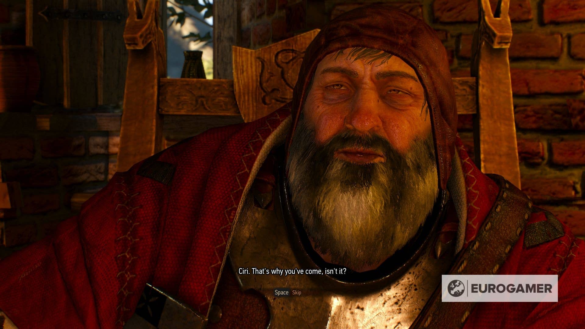 The Bloody Baron in The Witcher 3. A ruddy-faced older man with a long grey and black beard, clad in a metal breastplate and red jacket and hood.