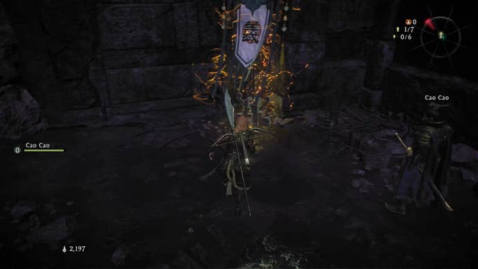 A Wo Long: Fallen Dynasty screenshot of the player standing next to a flag.