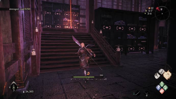 A Wo Long: Fallen Dynasty screenshot of the player standing next to a flag.