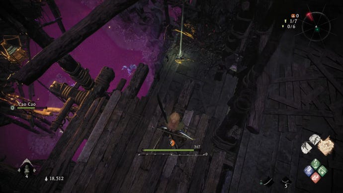 A Wo Long: Fallen Dynasty screenshot of the player standing next to a flag.