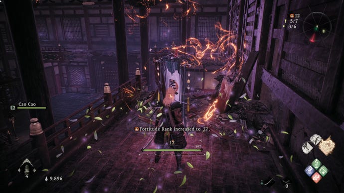 A Wo Long: Fallen Dynasty screenshot of the player standing next to a flag.