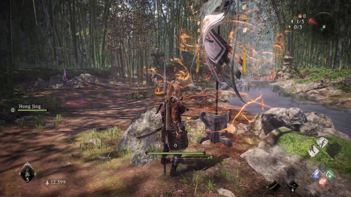 A Wo Long: Fallen Dynasty screenshot of the player standing next to a flag.