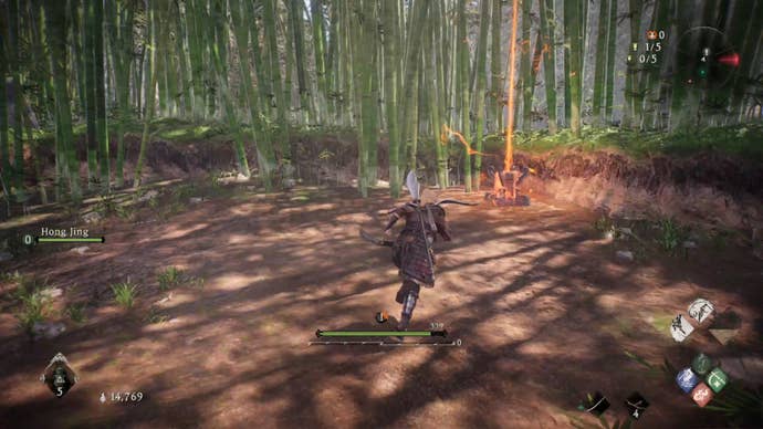 A Wo Long: Fallen Dynasty screenshot of the player standing next to a flag.