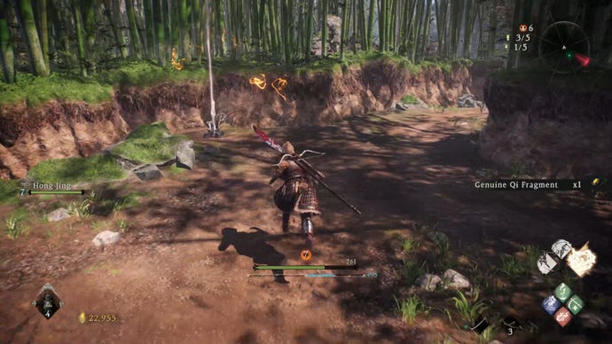 A Wo Long: Fallen Dynasty screenshot of the player standing next to a flag.