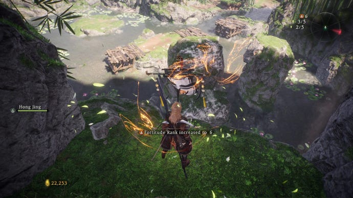 A Wo Long: Fallen Dynasty screenshot of the player standing next to a flag.