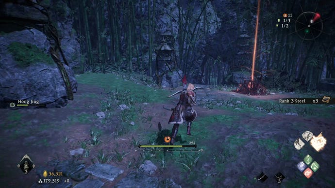 A Wo Long: Fallen Dynasty screenshot of the player standing next to a flag.