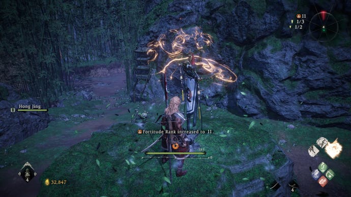 A Wo Long: Fallen Dynasty screenshot of the player standing next to a flag.