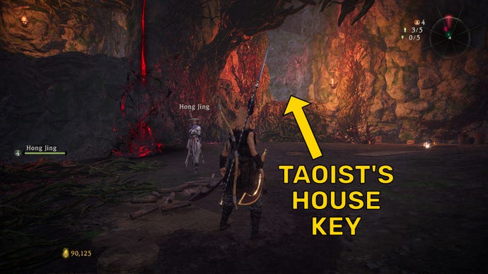 The player in Wo Long stands before a corrupted Battle Flag. An arrow points to the location of the Taoist’s House Key.