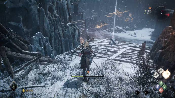 A Wo Long: Fallen Dynasty screenshot of the player standing next to a flag.