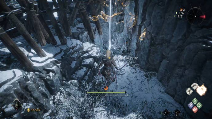 A Wo Long: Fallen Dynasty screenshot of the player standing next to a flag.