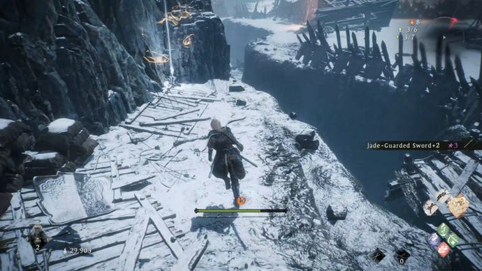 A Wo Long: Fallen Dynasty screenshot of the player standing next to a flag.