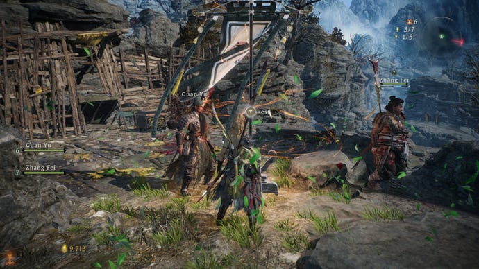 A Wo Long: Fallen Dynasty screenshot of the player standing next to a flag.