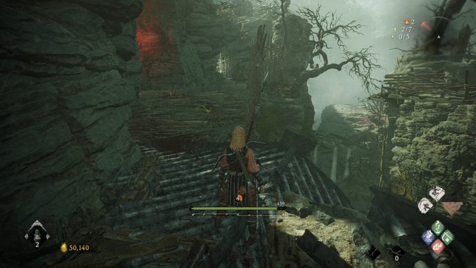 A Wo Long: Fallen Dynasty screenshot of the player standing next to a flag.