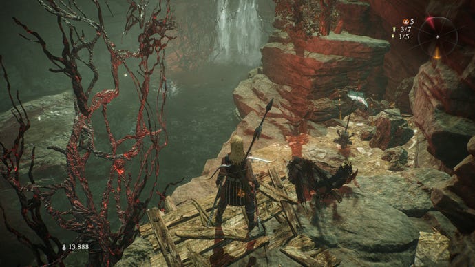 A Wo Long: Fallen Dynasty screenshot of the player standing next to a flag.