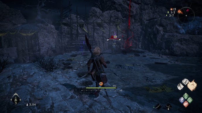 A Wo Long: Fallen Dynasty screenshot of the player standing next to a flag.