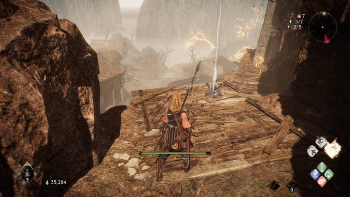 A Wo Long: Fallen Dynasty screenshot of the player standing next to a flag.