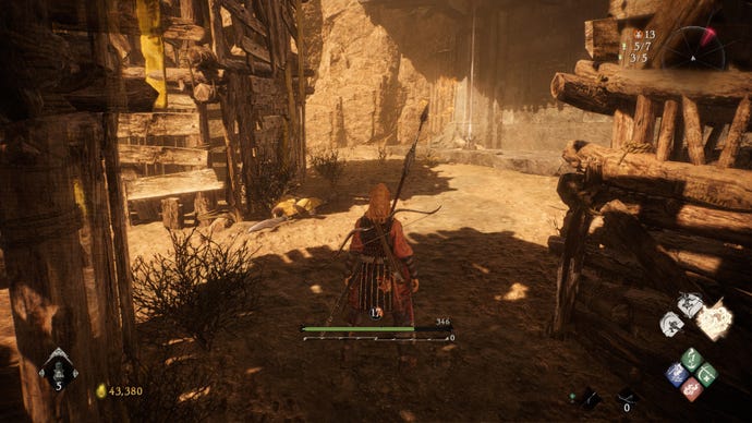 A Wo Long: Fallen Dynasty screenshot of the player standing next to a flag.