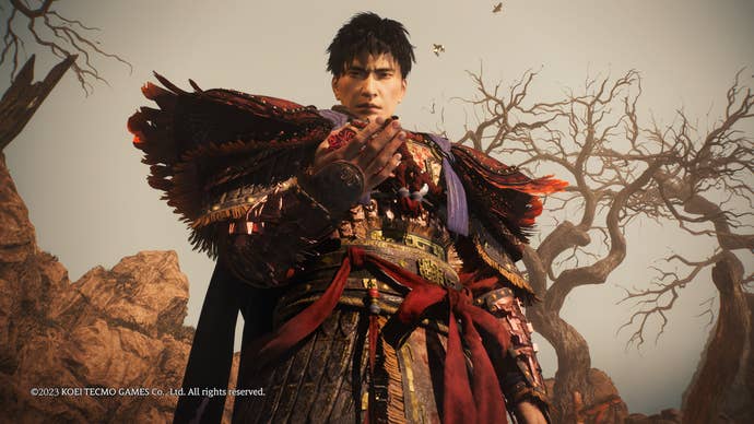 Wo Long Fallen Dynasty - a man in elaborate armour looks down at you