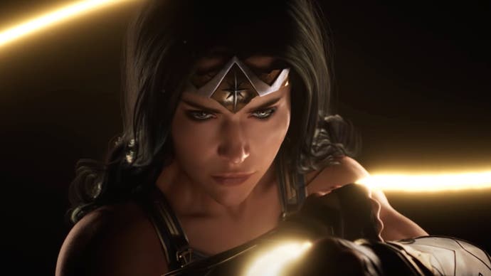 A still from the Wonder Woman game teaser trailer showing a close-up of the title character partially concealed in shadow.