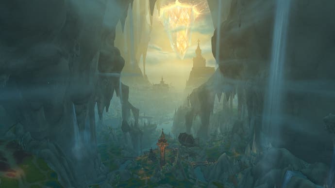 An incredibly large underground area in World of Warcraft: The War Within, dominated by an enormous sun-like glowing gem.
