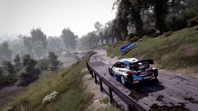 A bulky rally car races down a slippery tarmac roadworthy successful WRC 10.