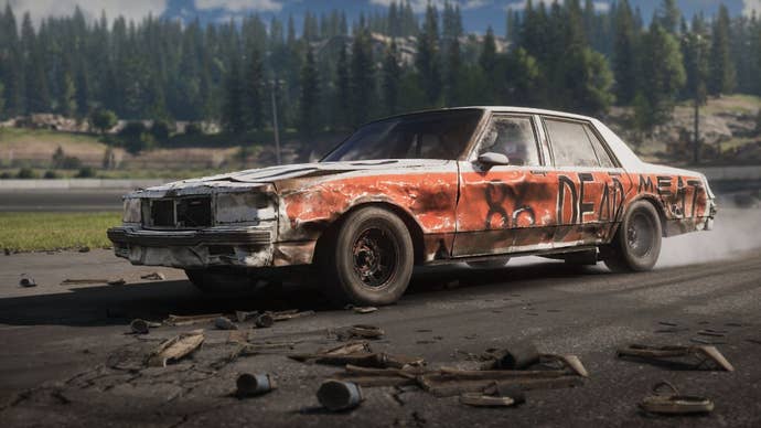 A rammer car speeds implicit a muddy racetrack.
