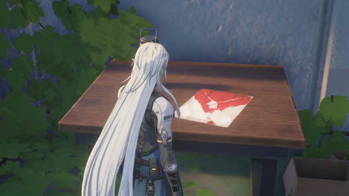 wuthering waves calcharo facing red white flyer on table