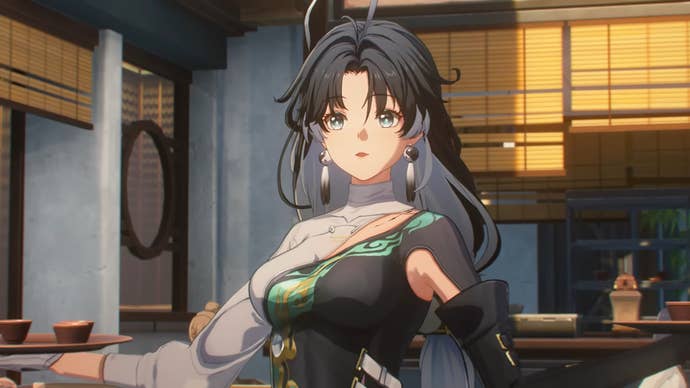 Jianxin stands arms outstretched at a restaurant in Wuthering Waves.