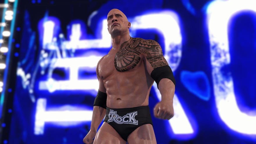 A screenshot of WWE 2k22 showing The Rock. You know it’s him because his underpants say “The Rock” on them.