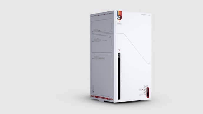 A photo of an Xbox Series X covered in the official Starfield wrap, featuring sci-fi paneling detailed in grey on white.