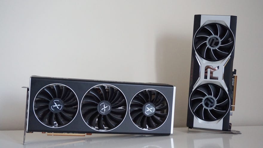 XFX’s Radeon RX 6700 XT Speedster Merc 319 Black Edition graphics card next to AMD’s Radeon RX 6700 XT graphics card